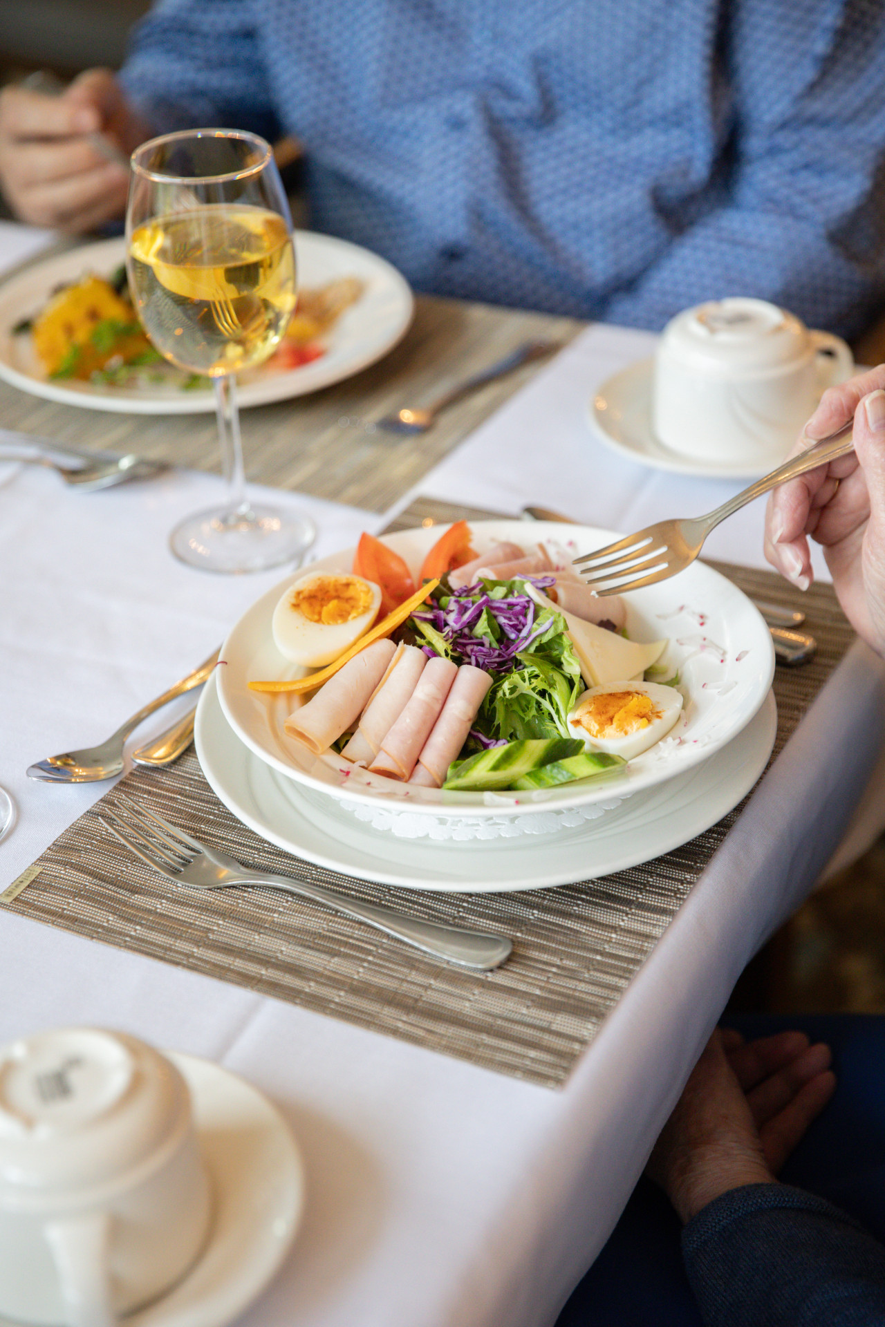 Colourful home-style meal plated for a resident in the Harvest House dining room, Olds